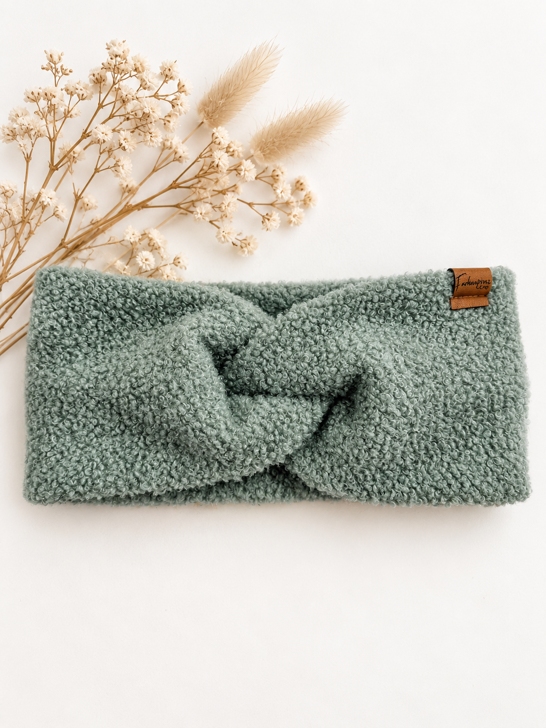 Breites Damen-Bouclé-Stirnband von Farbenprinz, warm, rutschfest, für 54-56cm Kopfumfang, stylisch und bequem.